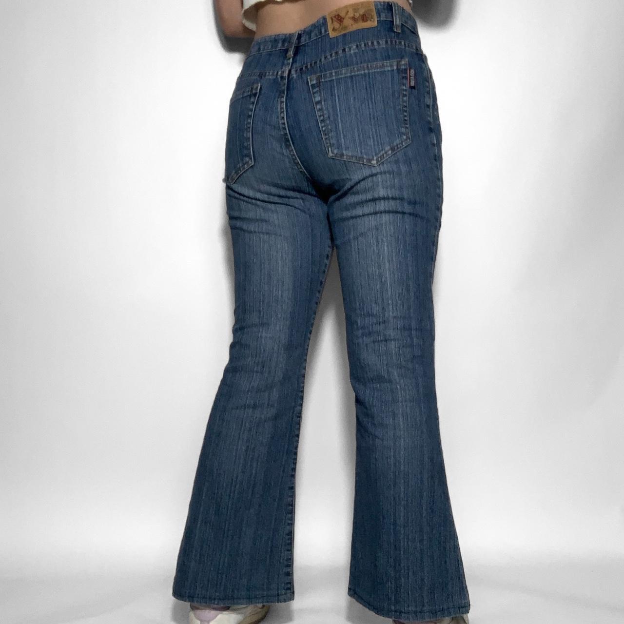 Vintage y2k blue swirl embroidered mid waisted flared jeans