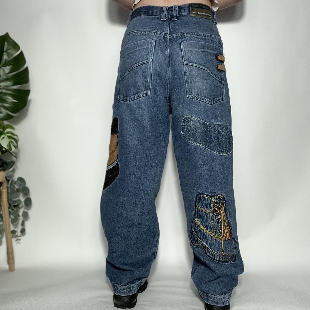 Vintage 90s Raw Blue baggy jeans with Timberland boot graphic